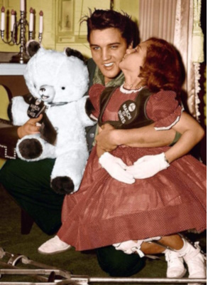 Elvis and a very happy child