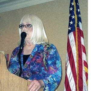 Chris Noel speaking at veteran's luncheon