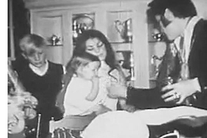 Elvis' family and unknown boy